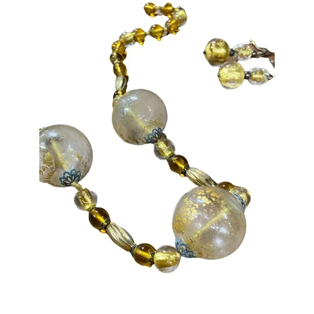 Gold tone beaded necklace‎